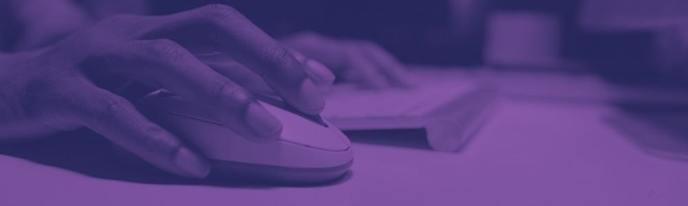 Hands using a keyboard and mouse